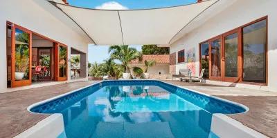 Blue Bay Family Villa – A Private Courtyard Retreat with Exceptional Indoor-Outdoor Living — photo 1