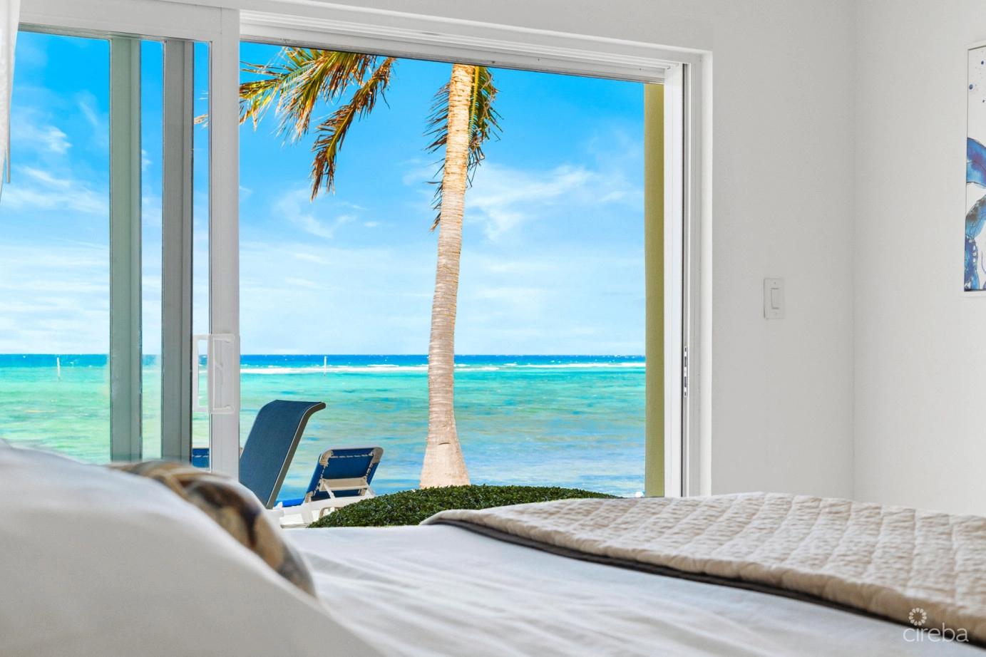 2-bedroom condo in East End, Grand Cayman — 50% ownership — photo 1