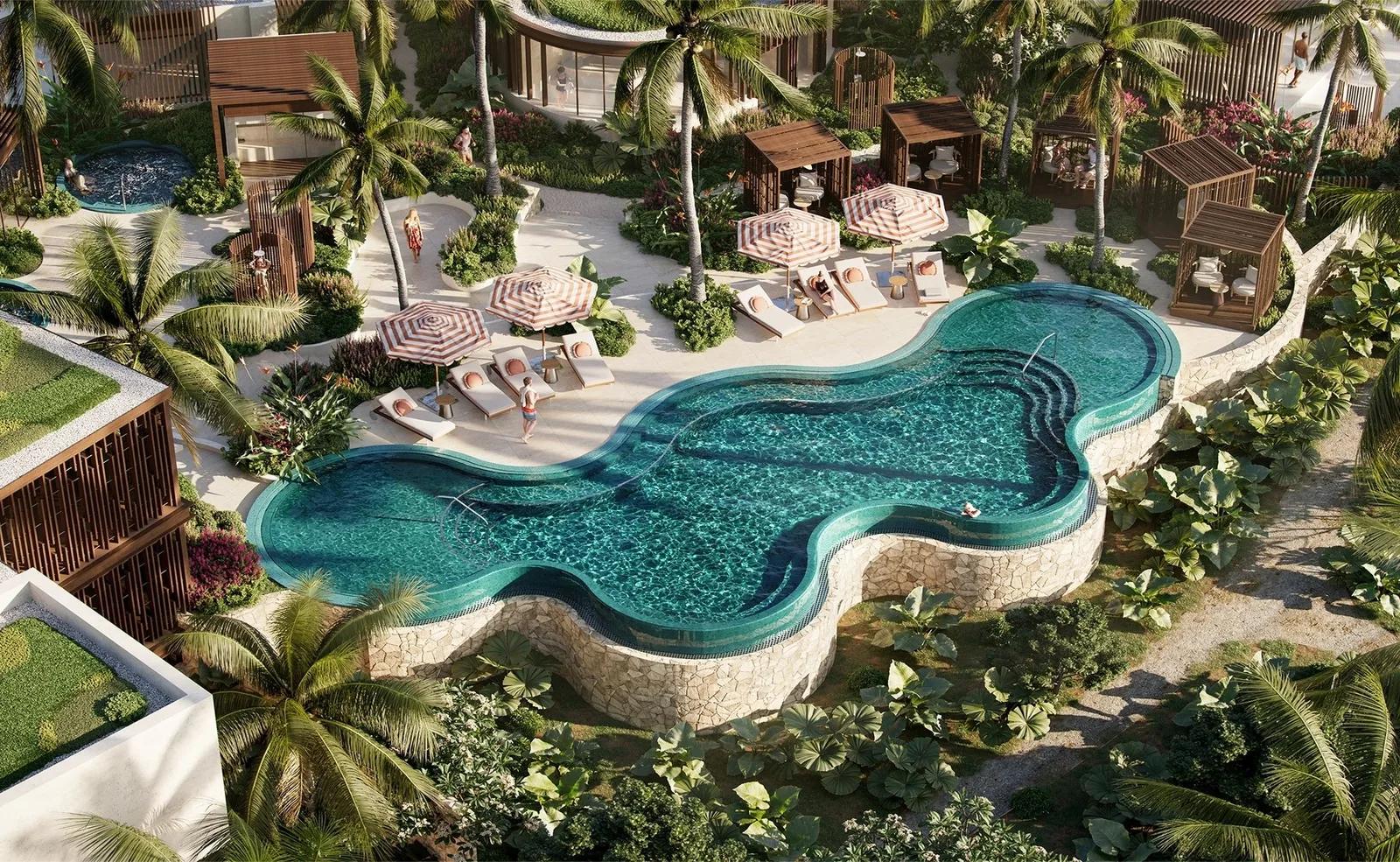 the freeform resort pool and shaded cabanas at The Setai, Indigo Bay